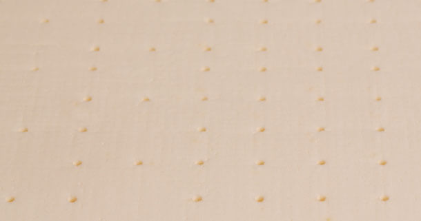 Natural perforated latex